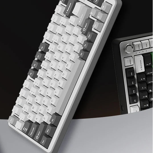 B75 PRO mechanical keyboard with knob on a dark surface